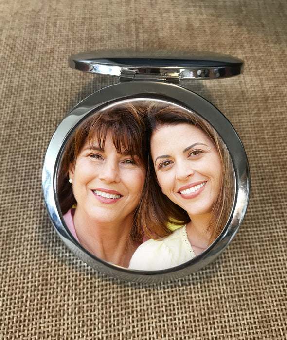 pocket mirror with photo of women