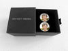 pair of photo cufflinks in box labeled Now That's Personal