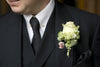 custom photo lapel pin on a man's suit