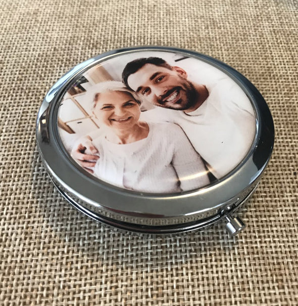 pocket mirror with photo of son and mother